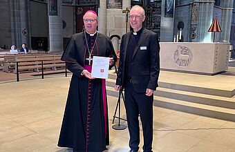 Bischof Dr. Stephan Ackermann und Pfarrer Dr. Marius Linnenborn (Leiter des DLI)